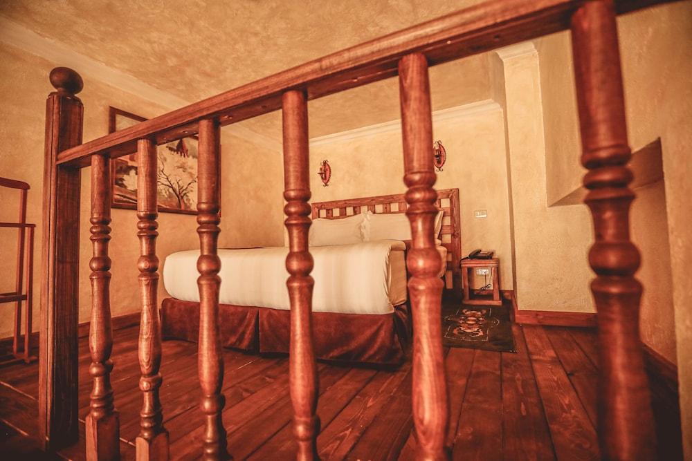 Caucasus Hotel Kasagh Kültér fotó A bed in a hotel room